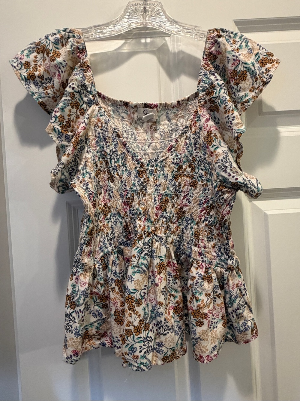 Cream Floral Smocked Peplum Top with Blue & Brown Accents